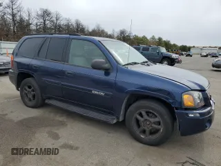 2004 GMC Envoy SLT with VIN 1GKDT13S242201036, listed as a Copart auction lot 50698255 with 152,575 mi miles and Salvage Title. Bid and sale history available at carsss.com. Image 4.