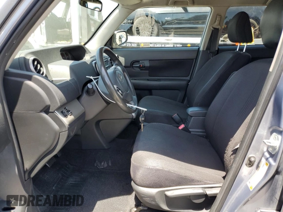 2009 Scion xB z VIN JTLKE50E991073625, wystawiony jako Copart lot #57295885 z przebiegiem 111 211 mil mil oraz Szkoda całkowita • Salvage title. Historia ofert i sprzedaży dostępna na DreamBid. Obrazek 7.