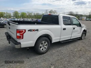 2019 Ford F-150 XL with VIN 1FTFW1E51KFC28124, listed as a Copart auction lot 54140585 with 14,881 mi miles and Salvage Title. Bid and sale history available at carsss.com. Image 3.