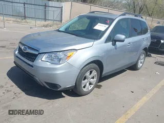 2015 Subaru Forester 2.5i Premium with VIN JF2SJAGC2FH403470, listed as a IAAI auction lot 42010790 with 174,127 mi miles. Bid and sale history available at carsss.com. Image 2.