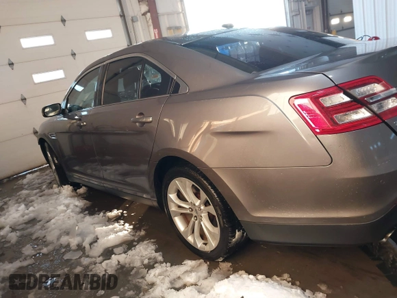 2013 Ford Taurus SEL z VIN 1FAHP2E89DG150197, wystawiony jako IAAI lot #41214999 z przebiegiem 146 307 mil mil oraz . Historia ofert i sprzedaży dostępna na DreamBid. Obrazek 15.