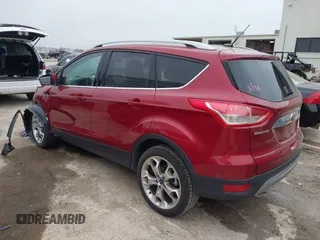 2015 Ford Escape Titanium with VIN 1FMCU0J98FUC07196, listed as a IAAI auction lot 41930660 with 51,161 mi miles and . Bid and sale history available at DreamBid. Image 3.