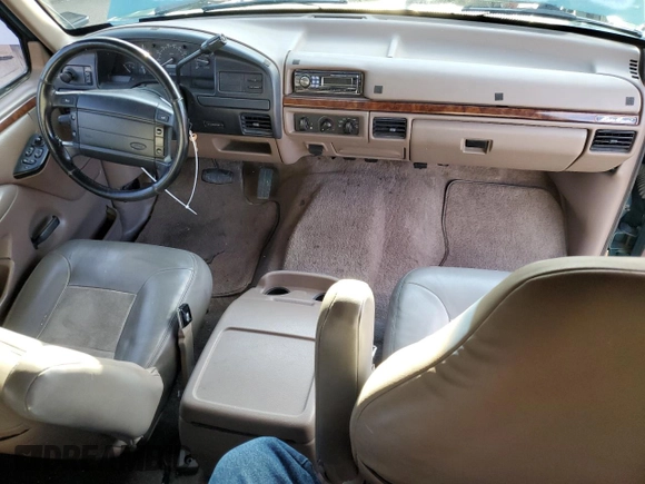 1996 Ford Bronco Custom with VIN 1FMEU15H4TLB59116, listed as a Copart auction lot 52989015 with 210,464 mi miles and Salvage title. Bid and sale history available at DreamBid. Image 8.