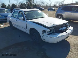 2005 Mercury Grand Marquis GS with VIN 2MEFM74W25X606638, listed as a IAAI auction lot 41646215 with 101,470 mi miles. Bid and sale history available at carsss.com. Image 1.