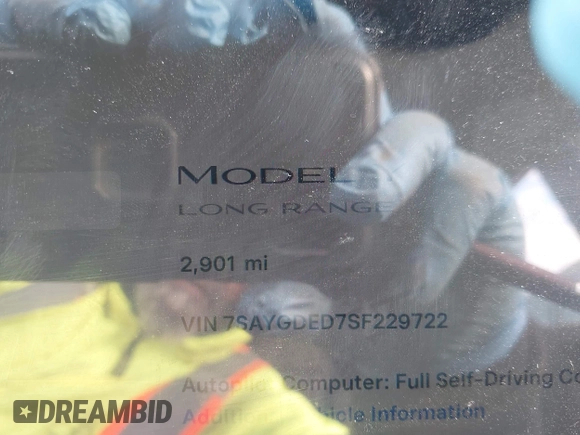 2025 Tesla Model Y Long Range with VIN 7SAYGDED7SF229722, listed as a IAAI auction lot 41330526 with 2,901 mi miles and . Bid and sale history available at DreamBid. Image 14.