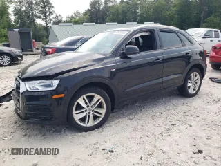 2018 Audi Q3 Premium with VIN WA1ECCFS2JR003934, listed as a Copart auction lot 60979015 with 97,517 mi miles and Salvage title. Bid and sale history available at DreamBid. Image 1.