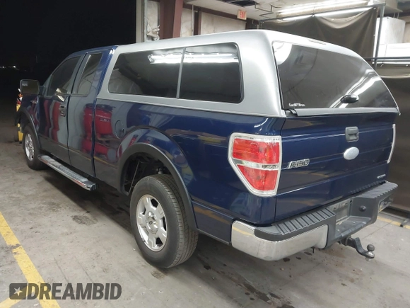 2011 Ford F-150 XL with VIN 1FTFX1CF0BFD42141, listed as a IAAI auction lot 41612837 with 195,235 mi miles. Bid and sale history available at carsss.com. Image 3.