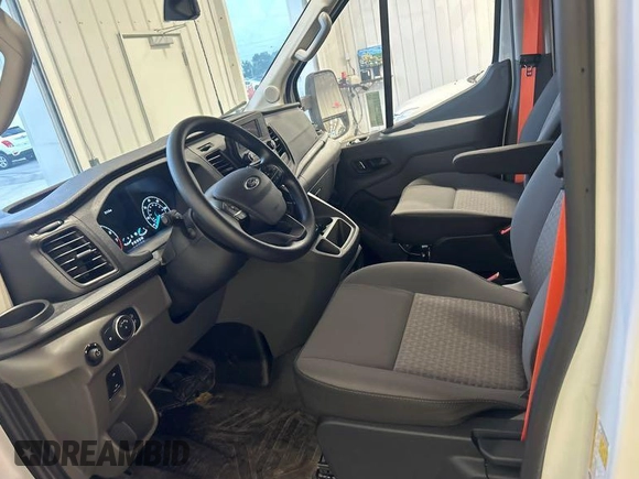 2023 Ford Transit Cargo with VIN 1FTBR1X81PKA75434, listed as a IAAI auction lot 42742887 with 5,111 mi miles and . Bid and sale history available at DreamBid. Image 1.