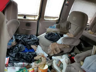 1999 Ford Econoline Cargo with VIN 1FDRE14W5XHB75137, listed as a Copart auction lot 53663605 with 147,149 mi miles and Salvage Title. Bid and sale history available at carsss.com. Image 11.