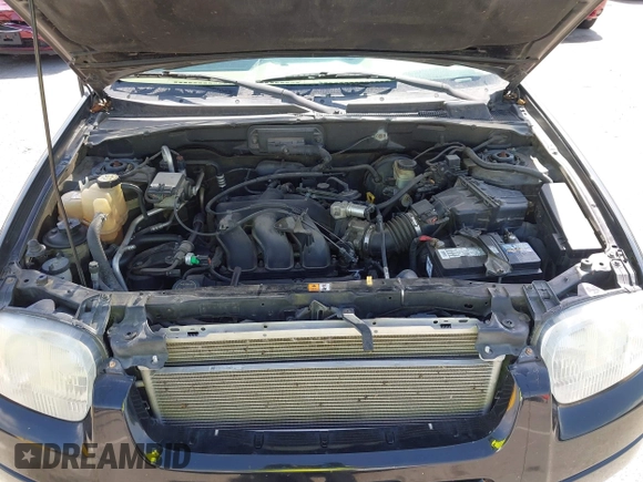 2003 Ford Escape Limited z VIN 1FMCU941X3KB46631, wystawiony jako IAAI lot #42315601 z przebiegiem 202 237 mil mil oraz . Historia ofert i sprzedaży dostępna na DreamBid. Obrazek 10.