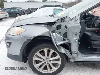 2012 Mazda CX-9 Grand Touring with VIN JM3TB3DV2C0353558, listed as a IAAI auction lot 41397266 with 158,843 mi miles and . Bid and sale history available at DreamBid. Image 13.