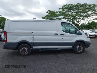 2018 Ford Transit z VIN 1FTYR1YM9JKB43850, wystawiony jako IAAI lot #42151963 z przebiegiem 72 286 mil mil oraz . Historia ofert i sprzedaży dostępna na DreamBid. Obrazek 13.