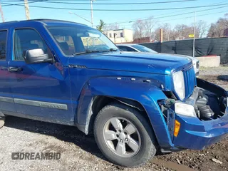 2010 Jeep Liberty Sport with VIN 1J4PN2GK2AW179248, listed as a IAAI auction lot 41952965 with 215,995 mi miles. Bid and sale history available at carsss.com. Image 6.