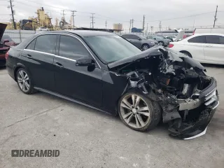 2014 Mercedes-Benz E 350 Sport with VIN WDDHF5KB7EB050618, listed as a Copart auction lot 50875045 with 157,722 mi miles and Salvage Title. Bid and sale history available at DreamBid. Image 4.