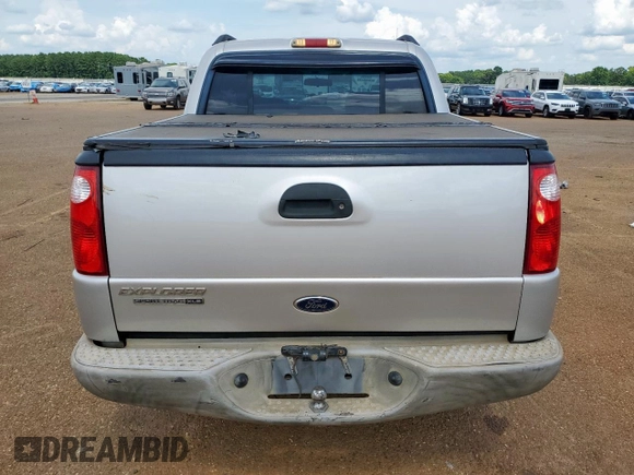 2005 Ford Explorer Sport Trac XLS with VIN 1FMZU67K95UA94980, listed as a Copart auction lot 63490315 with 126,737 mi miles and Salvage title. Bid and sale history available at DreamBid. Image 6.