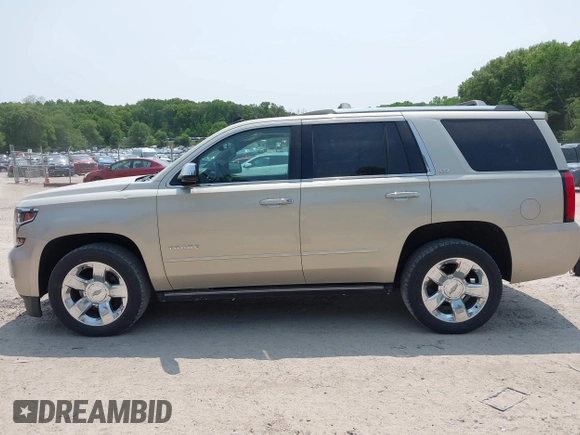 2015 Chevrolet Tahoe LTZ z VIN 1GNSKCKC0FR113647, wystawiony jako IAAI lot #42288089 z przebiegiem 113 322 mil mil oraz . Historia ofert i sprzedaży dostępna na DreamBid. Obrazek 14.