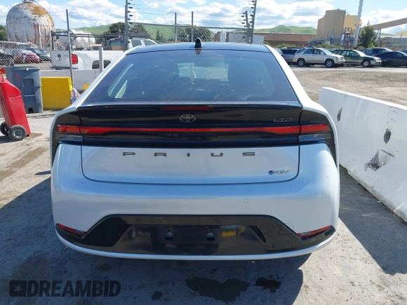 2023 Toyota Prius LE with VIN JTDACAAUXP3012538, listed as a IAAI auction lot 41948103 with 33,338 mi miles and . Bid and sale history available at DreamBid. Image 16.