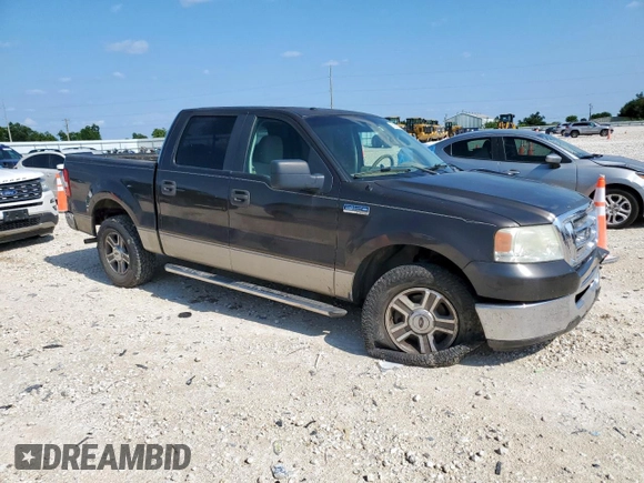 2007 Ford F-150 XLT with VIN 1FTRW12W37KB03263, listed as a Copart auction lot 61087375 with 167,585 mi miles and Salvage title. Bid and sale history available at DreamBid. Image 4.