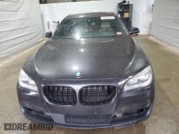 2015 BMW 7 Series 750Li xDrive z VIN WBAYF8C57FD653916, wystawiony jako Copart lot #52864275 z przebiegiem 138 811 mil mil oraz Szkoda całkowita • Salvage title. Historia ofert i sprzedaży dostępna na DreamBid. Obrazek 5.