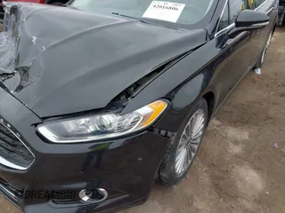 2015 Ford Fusion Titanium with VIN 3FA6P0K93FR223195, listed as a IAAI auction lot 42016806 with 94,312 mi miles. Bid and sale history available at carsss.com. Image 17.