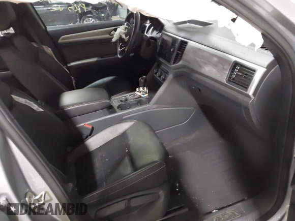 2021 Volkswagen Atlas SE z VIN 1V2HE2CA9MC219076, wystawiony jako IAAI lot #41608670 z przebiegiem 56 162 mil mil oraz . Historia ofert i sprzedaży dostępna na DreamBid. Obrazek 5.