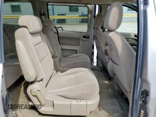 2004 Ford Freestar SEL z VIN 2FMZA52214BA84555, wystawiony jako Copart lot #54569535 z przebiegiem Nie podano mil oraz Szkoda całkowita • Salvage title. Historia ofert i sprzedaży dostępna na DreamBid. Obrazek 11.