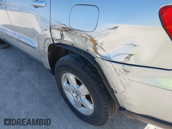 2011 Jeep Grand Cherokee Laredo z VIN 1J4RR4GG3BC589578, wystawiony jako IAAI lot #41804883 z przebiegiem 113 016 mil mil oraz . Historia ofert i sprzedaży dostępna na DreamBid. Obrazek 17.