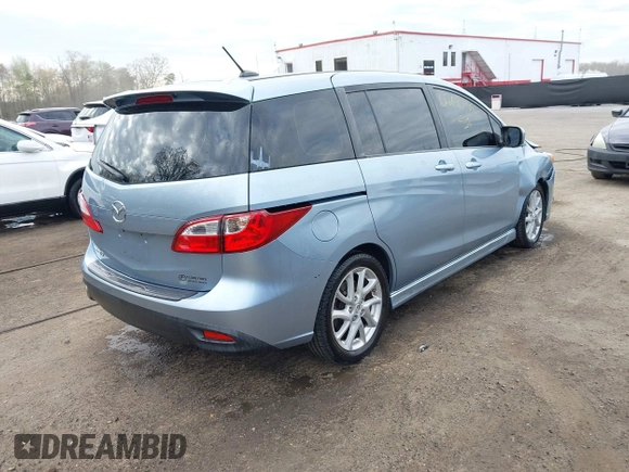 2012 Mazda 5 Grand Touring with VIN JM1CW2DL4C0141511, listed as a IAAI auction lot 42001392 with 99,097 mi miles and . Bid and sale history available at carsss.com. Image 4.