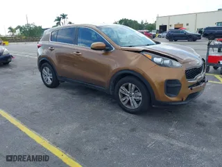 2018 Kia Sportage LX with VIN KNDPM3AC5J7339455, listed as a IAAI auction lot 41759615 with 74340 miles. Bid and sale history available at carsss.com. Image 1.