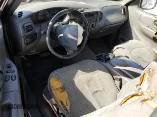 2000 Ford F-150 XL с VIN 1FTZX0726YKB47787, выставлен на аукционе Copart как лот 49712445 с пробегом Не указан миль и Списание • Salvage title. История ставок и продаж доступна на DreamBid. Изображение 8.