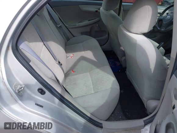 2009 Toyota Corolla with VIN 2T1BU40E99C175172, listed as a IAAI auction lot 42072575 with 176,714 mi miles. Bid and sale history available at carsss.com. Image 8.