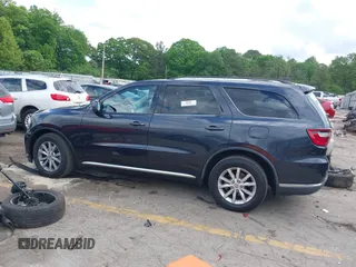 2014 Dodge Durango SXT with VIN 1C4RDHAG5EC286603, listed as a IAAI auction lot 42092392 with 152,503 mi miles and . Bid and sale history available at DreamBid. Image 14.