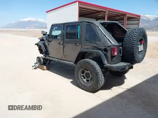 2014 Jeep Wrangler Unlimited Rubicon с VIN 1C4BJWFG2EL279938, выставлен на аукционе IAAI как лот 41920729 с пробегом 76 418 миль миль и . История ставок и продаж доступна на DreamBid. Изображение 3.