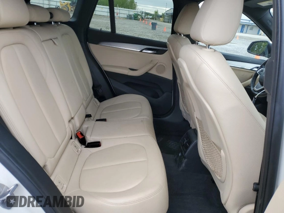 2016 BMW X1 xDrive28i z VIN WBXHT3C37GP882189, wystawiony jako Copart lot #56983985 z przebiegiem 45 700 mil mil oraz Szkoda całkowita • Salvage title. Historia ofert i sprzedaży dostępna na DreamBid. Obrazek 11.