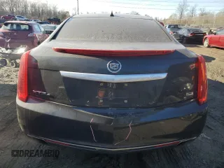 2013 Cadillac XTS Platinum z VIN 2G61V5S3XD9100843, wystawiony jako Copart lot #42943555 z przebiegiem 122 153 mil mil oraz Szkody całkowita. Historia ofert i sprzedaży dostępna na DreamBid. Obrazek 6.