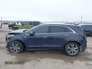 2024 Cadillac XT5 FWD Premium Luxury with VIN 1GYKNCR47RZ755652, listed as a IAAI auction lot 41512069 with 10,243 mi miles. Bid and sale history available at carsss.com. Image 14.
