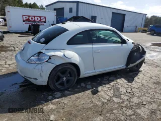 2014 Volkswagen Beetle 1.8T z VIN 3VWJ17AT1EM665073, wystawiony jako Copart lot #47805405 z przebiegiem 92 303 mil mil oraz Szkoda całkowita • Salvage title. Historia ofert i sprzedaży dostępna na DreamBid. Obrazek 3.