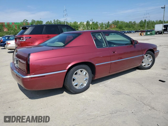 1997 Cadillac Eldorado ESC z VIN 1G6EL12Y5VU614955, wystawiony jako Copart lot #56222345 z przebiegiem 62 030 mil mil oraz Tytuł czysty. Historia ofert i sprzedaży dostępna na DreamBid. Obrazek 3.