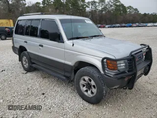 1995 Mitsubishi Montero z VIN JA4MR41H7SJ024208, wystawiony jako Copart lot #42971825 z przebiegiem 313 990 mil mil oraz Szkoda całkowita • Salvage title. Historia ofert i sprzedaży dostępna na DreamBid. Obrazek 4.