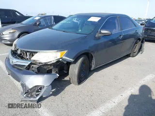 2012 Toyota Camry L z VIN 4T4BF1FK2CR211222, wystawiony jako IAAI lot #41904784 z przebiegiem 157 255 mil mil oraz . Historia ofert i sprzedaży dostępna na DreamBid. Obrazek 2.