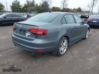 2016 Volkswagen Jetta Sedan 1.4T SE w/Connectivity with VIN 3VWD67AJ0GM255333, listed as a IAAI auction lot 41533835 with 53,277 mi miles. Bid and sale history available at carsss.com. Image 4.