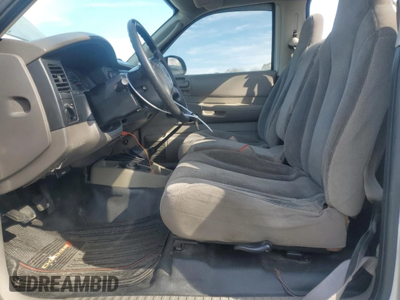 2003 Dodge Dakota with VIN 1D7FL16X23S122093, listed as a Copart auction lot 87394974 with 264,510 mi miles and Salvage Title. Bid and sale history available at carsss.com. Image 7.