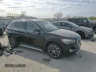 2020 BMW X1 xDrive28i with VIN WBXJG9C06L5P89796, listed as a Copart auction lot 52817235 with 95,665 mi miles and Salvage title. Bid and sale history available at DreamBid. Image 12.