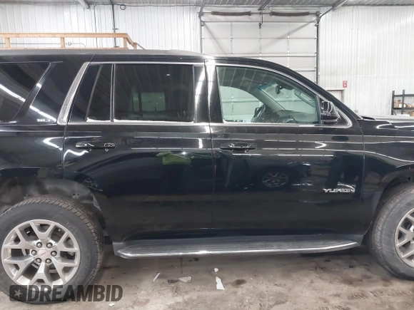 2016 GMC Yukon SLT with VIN 1GKS2BKC9GR176948, listed as a IAAI auction lot 41361221 with 125,178 mi miles. Bid and sale history available at carsss.com. Image 14.