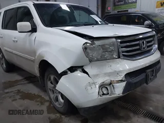 2015 Honda Pilot EX-L with VIN 5FNYF4H59FB023814, listed as a IAAI auction lot 41161235 with 216,437 mi miles and . Bid and sale history available at carsss.com. Image 6.