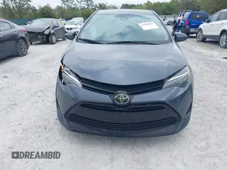 2019 Toyota Corolla L z VIN 5YFBURHE1KP947817, wystawiony jako IAAI lot #41959566 z przebiegiem 128 574 mil mil oraz . Historia ofert i sprzedaży dostępna na DreamBid. Obrazek 13.