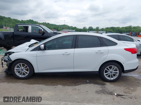 2018 Ford Focus SE z VIN 1FADP3F21JL257262, wystawiony jako IAAI lot #42174952 z przebiegiem 138 872 mil mil oraz . Historia ofert i sprzedaży dostępna na DreamBid. Obrazek 15.