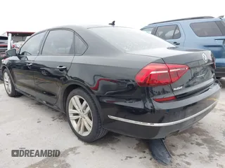 2019 Volkswagen Passat 2.0T Wolfsburg Edition with VIN 1VWLA7A36KC007173, listed as a IAAI auction lot 41357381 with 79,356 mi miles. Bid and sale history available at carsss.com. Image 3.