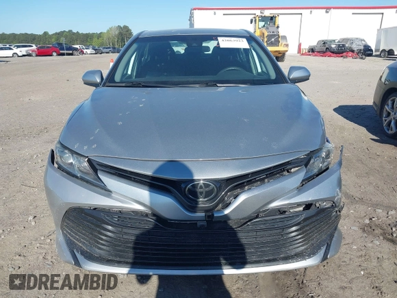 2019 Toyota Camry LE z VIN 4T1B11HK7KU756675, wystawiony jako IAAI lot #42063923 z przebiegiem 132 312 mil mil oraz . Historia ofert i sprzedaży dostępna na DreamBid. Obrazek 12.