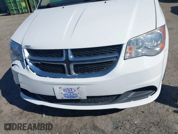 2016 Dodge Grand Caravan SE with VIN 2C4RDGBG2GR114564, listed as a IAAI auction lot 41838735 with 103,348 mi miles and . Bid and sale history available at DreamBid. Image 13.